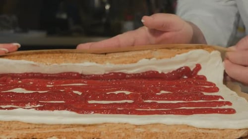 Cake Layers with Jam and White Frosting