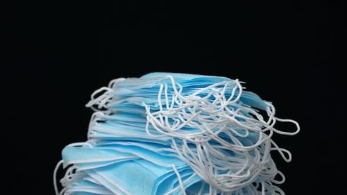 Pile of Blue Surgical Masks for Medical Protection