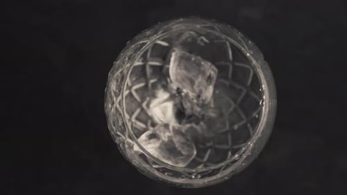 Ice Cubes Falls Empty Glass Closeup