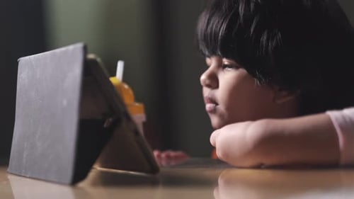 Child Girl Using Digital Tablet at Night