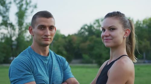 Athletic couple smiling