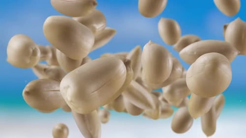 Heap of Peanuts Against Blue Sky and Sea
