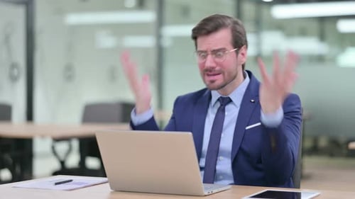 Frustrated Businessman Reacting to Computer Error