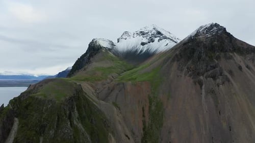 Drone Of Vestrahorn Mountain With Stream And Snow