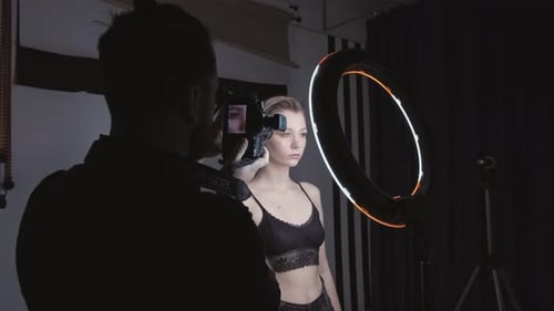 Man Photographer Photographing in the Studio