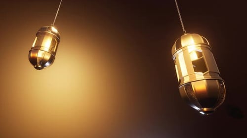 Elegant Golden Islamic Lanterns Swaying with Glowing Light