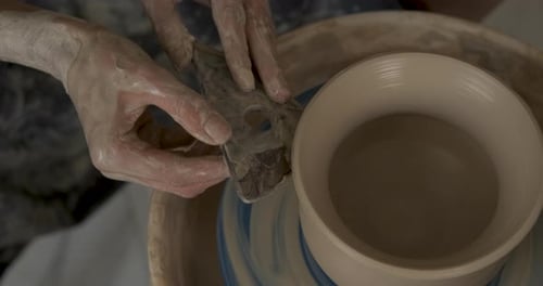 Close Up of Pottery Artist at Work Potter Master Creating Clay Pot on a Wheel