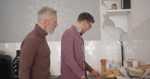 Romantic Couple Cooking Breakfast Together in Kitchen