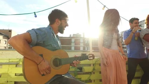 Friends Celebrate and Enjoy Music on Rooftop
