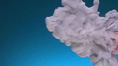 Abstract Paint Clouds Swirling in Water