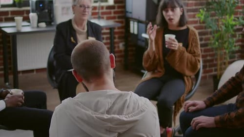 Adults at Group Therapy Meeting in Circle