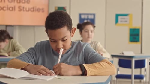 African American School Boy in Classroom