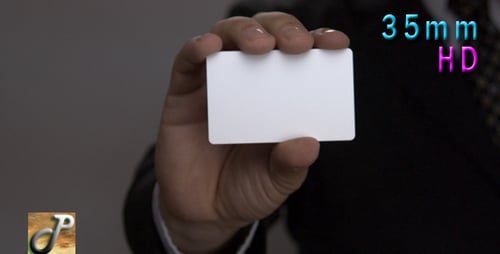 Blank White Business Card Held By Person in Suit
