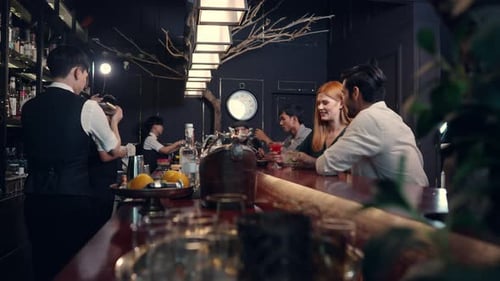 4K Group of People enjoy hangout nightlife at luxury bar.