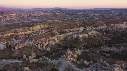 Majestic View of Cappadocia Rock Formations at Sunset