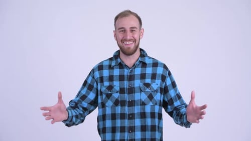 Man Smiling and Giving Thumbs Up Gesture