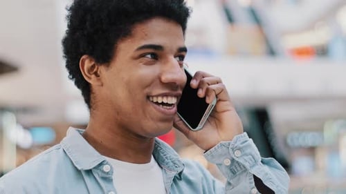Young Adult Talking on a Smartphone