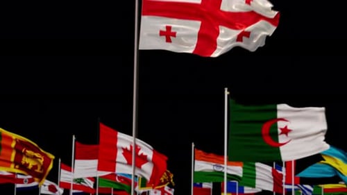 Realistic Waving Flag of Georgia with Blurred International Flags