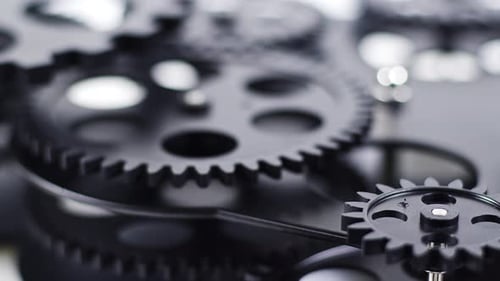 Close Up of Black Gears Turning