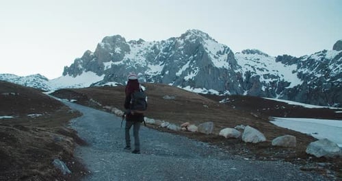 Man Hold His Daughter on Neck on Hike Travel Adventure at Epic Mountain