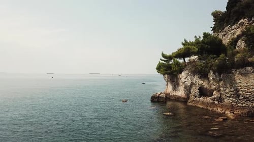 Picturesque Cliffside Landscape by the Calm Ocean