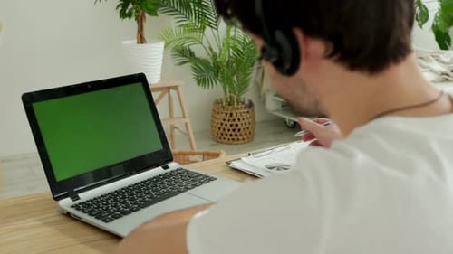 Closeup Freelancer Male Hands Using Green Screen Chroma Key Laptop Typing Working in Light Office