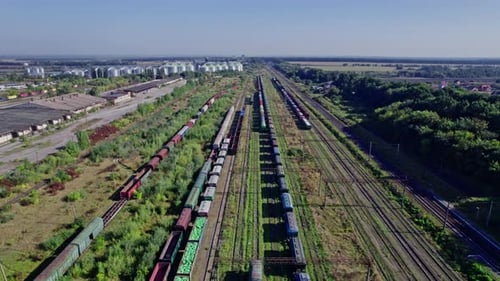 Aerial View of a Train Yard on a Sunny Day