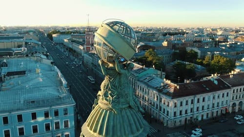 Aerial View of City Statue at Sunrise