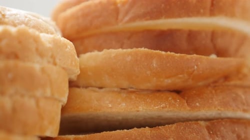 Golden Brown Slices of Stacked Bread Close-Up