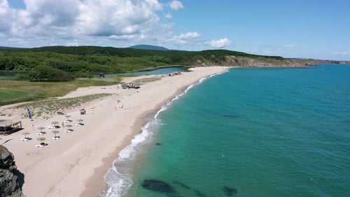 Drone flight over a picturesque sandy beach