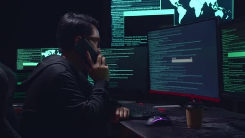 Coder on Phone with Multiple Monitors