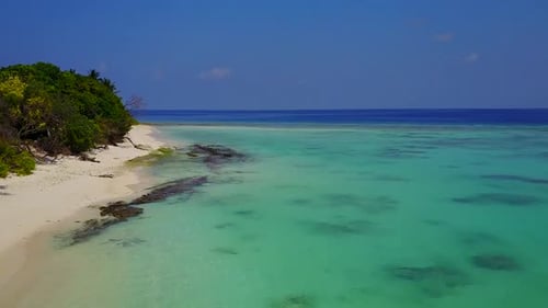 Aerial sky of seashore beach by blue lagoon with sand background