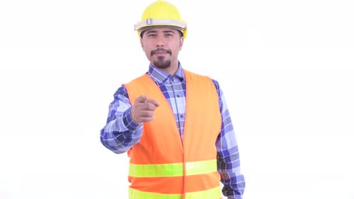 Happy Bearded Persian Man Construction Worker Pointing at Camera