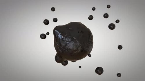Hintergrundanimation schwarz glänzend rundes Objekt und Partikel, die um ihn herum verstreut