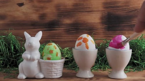 Decorating Easter Eggs with Paint for Spring Holiday