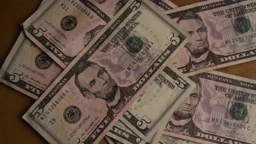 Rotierende Aufnahme von amerikanischem Geld (Währung)