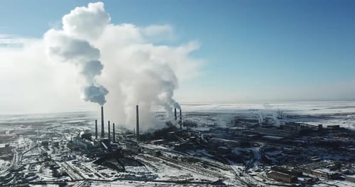Smoke From the Pipes of a Factory Near the City