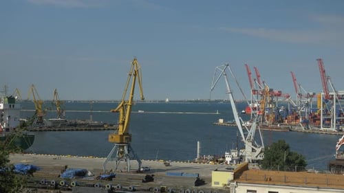 Commercial port with cargo ships loading export and import goods and containers in harbor