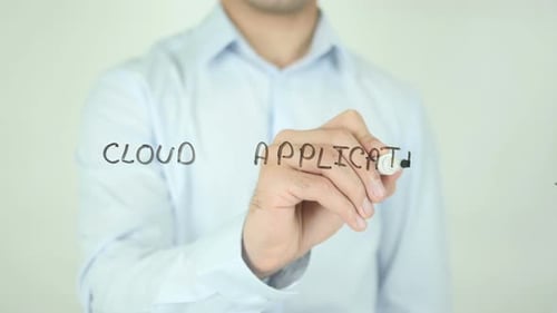 Man Writes "Cloud Application" On Glass