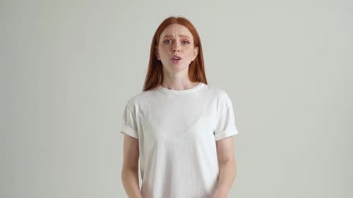 Woman in White T-shirt Pleading