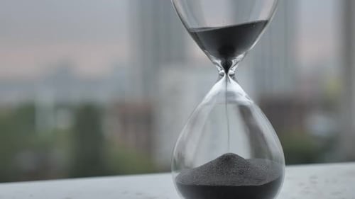 Hourglass with Black Sand Counting Down
