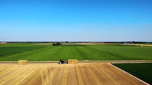 Harvesting Machinetractor Working in the Field