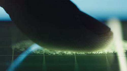 Finger Touching Futuristic Tech Screen Close Up