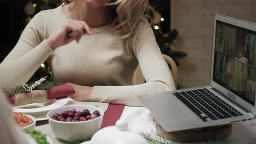 Woman Connects With Family Through Video Call