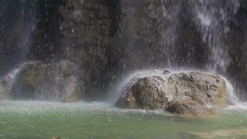 Water Dropping on Stones, Waterfall in the Park of Castle Hill in Nice, France