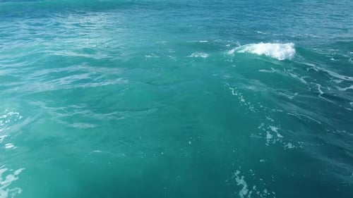 Pure Blue Ocean Water Waves with Light Reflections at Slow Motion Powerful Storm on the Sea
