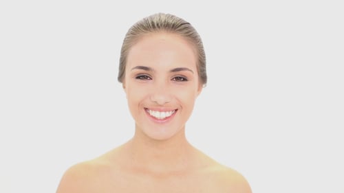 Woman Applies Makeup with Brush, Smiling Portrait