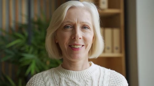 Smiling Senior Woman With Short Blonde Hair