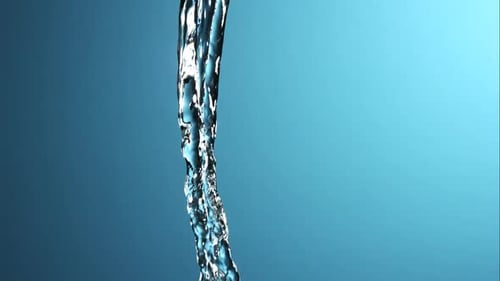 Water Stream Flows Down in a Close Up