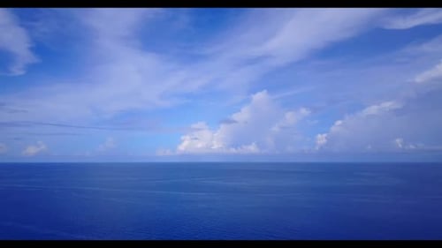 Aerial drone shot nature of relaxing sea view beach adventure by shallow ocean and white sandy backg